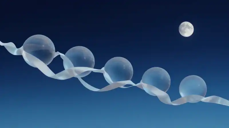 Five translucent spheres connected by flowing silk on navy