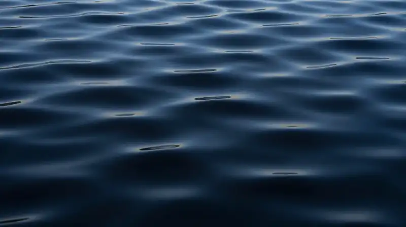 Translucent blue geometric waves ripple in overlapping, abstract patterns
