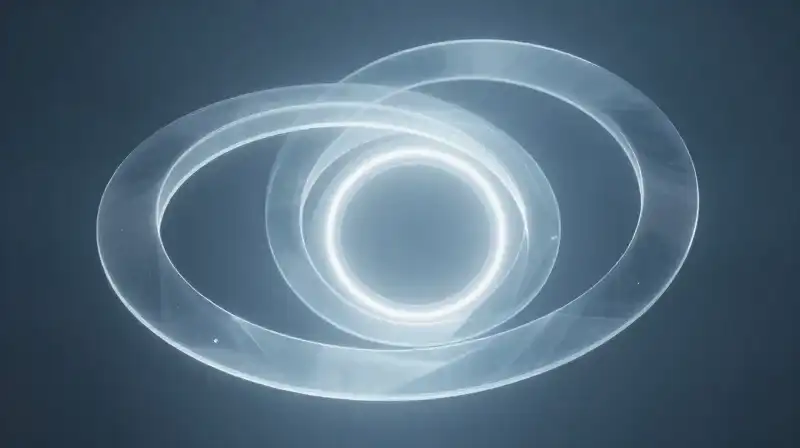 Glowing blue glass rings spiral through a misty atmosphere
